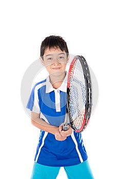 Little boy playing tennis racket and tennis ball in hand