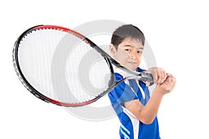 Little boy playing tennis racket and tennis ball in hand