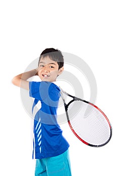 Little boy playing tennis racket and tennis ball in hand