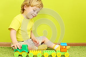 Little boy playing with a toy