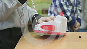 Little boy playing with toy phone indoors