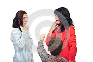 Little boy pointing to two women