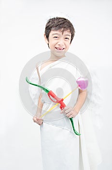 Little boy portrait pretend as cupid with wing