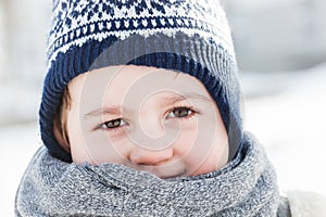 Little boy portrait in winter. Happy child