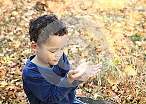 Little boy praying to God