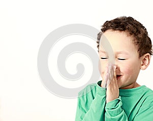 little boy praying to God stock photo