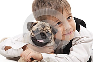 Little boy and the Pug-dog