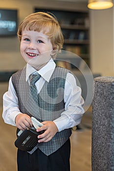 Little boy with a puncher in the business photo