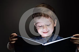 Little boy read book