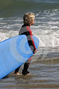 Little boy ready for surfing