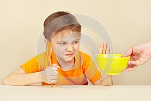 Little boy refuses to eat cereal