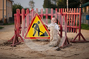 Little boy on the repaired road