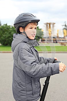 Little boy ride on segway photo