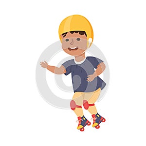 Little Boy on Roller Skates in Skate Park Wearing Protective Helmet and Kneepads Having Fun and Enjoying Recreational