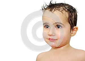 Little boy with shampoo in wet hair