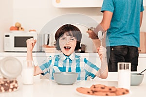 Little Boy in Shirt Have Fun in Kitchen in Morning