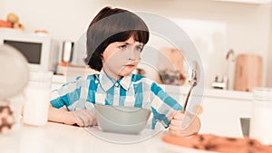 Little Boy in Shirt Have Fun in Kitchen in Morning
