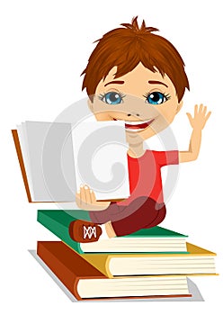 Little boy showing an open book sitting on stack of books