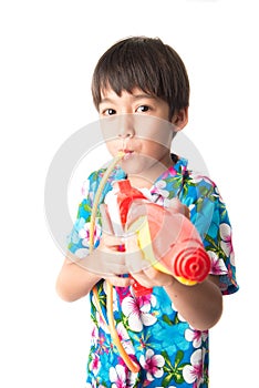 Little boy sibling boy in Thai flower dress tradition for Thai new year