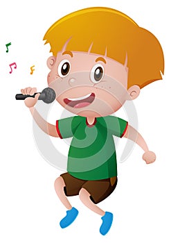 Little boy singing with microphone