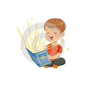 Little boy sitting on the floor with magic book radiating bright sparks and stars. Kid character reading interesting