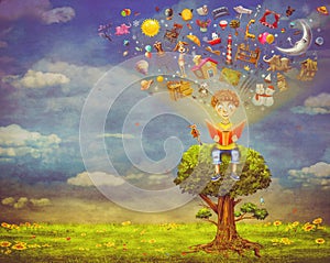 Little boy sitting on the tree and reading a book