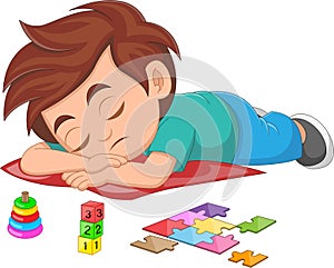 little boy sleeping after educational toys