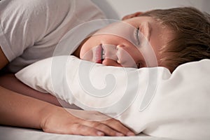 Little boy sleeping with open mouth photo