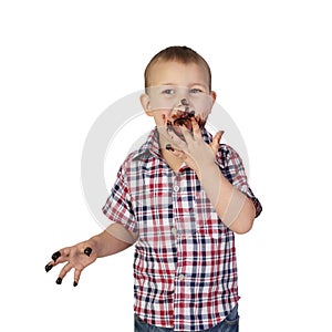 Little boy smeared with chocolate