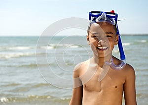 Little boy smiling with snorkel