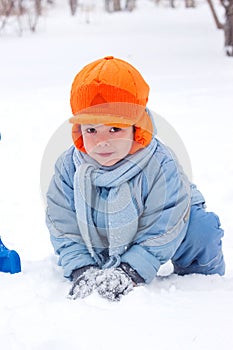 Little boy snowman sculpts photo