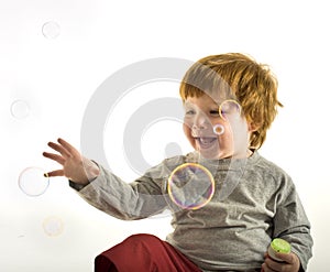 Little boy soap bubbles