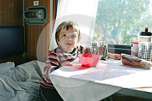 Little boy in speeding train