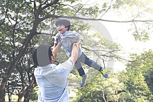 Little boy spending time with his father