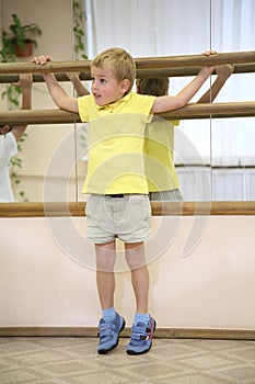 Little boy in sporthall