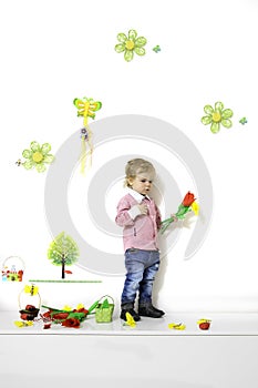 Little boy in spring arrangement photo