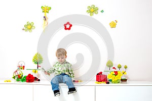 Little boy spring arrangement photo