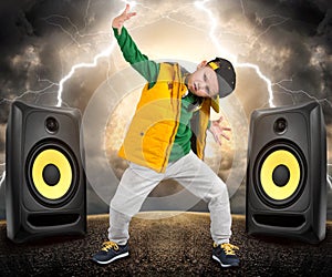 The little boy in the style of Hip-Hop . Children`s fashion.Cap and jacket. The Young Rapper.Cool Dancer.