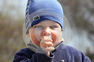 Little boy sucking his thumb