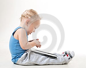 A little boy in a suit and glasses photo