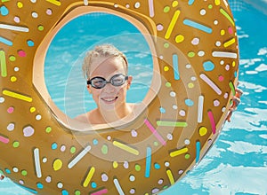 Little boy at swimming pool