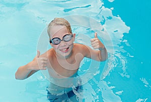 Little boy at swimming pool