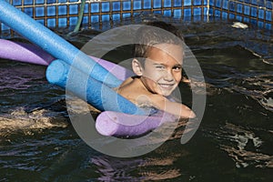 Little boy in swimming pool