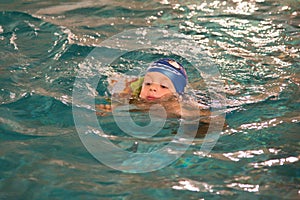 Little boy in the swimming pool