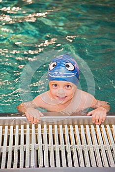 Little boy in the swimming pool