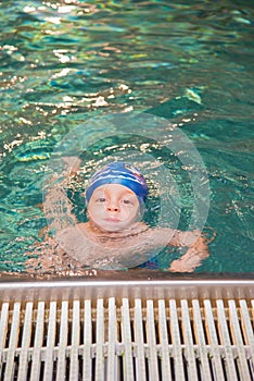 Little boy in the swimming pool