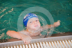 Little boy in the swimming pool