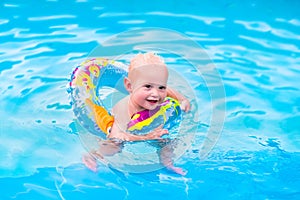 Little boy in swimming pool