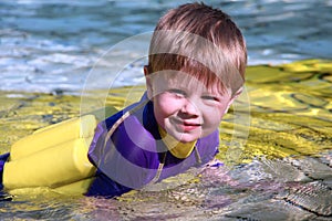 Little boy in swimming pool