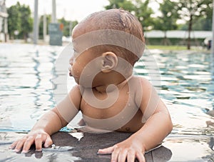 Little boy in the swimming pool